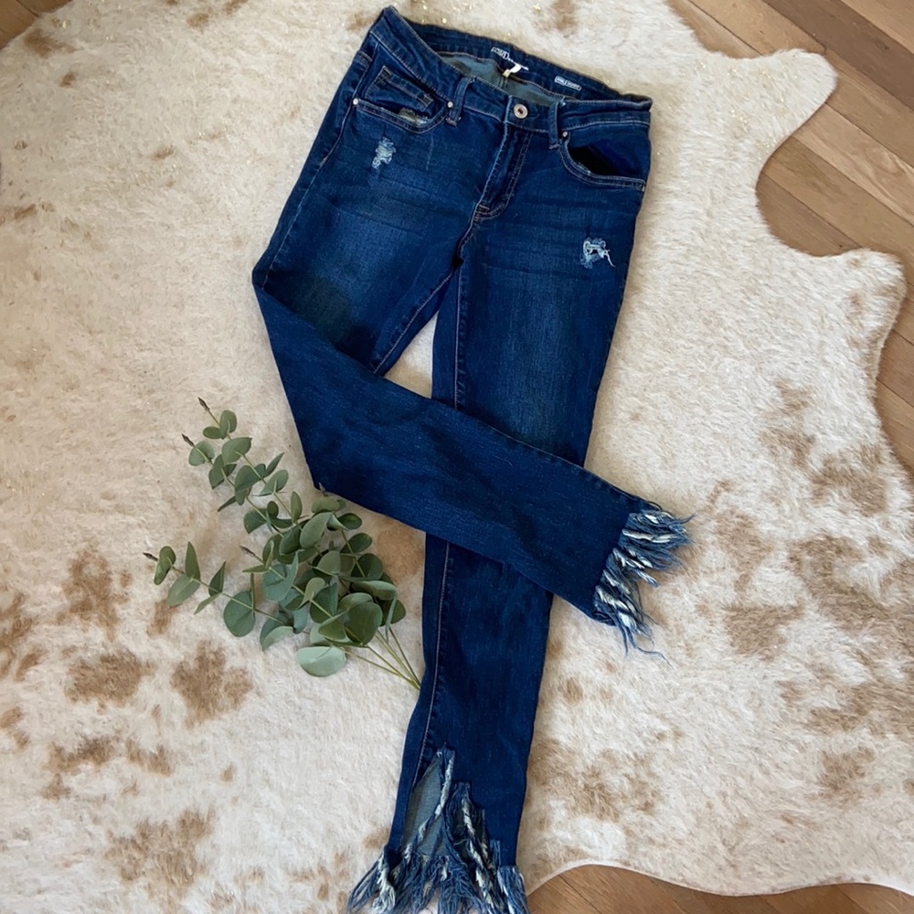 Frayed and Distressed Shark Bite Hem Skinny Jeans